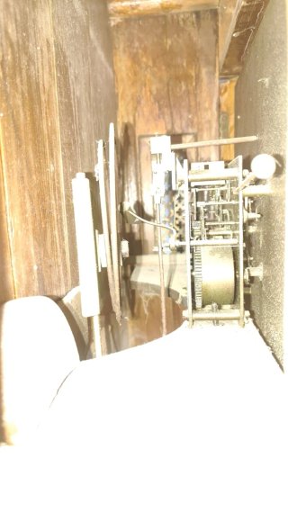 Reloj de pared antiguo de madera