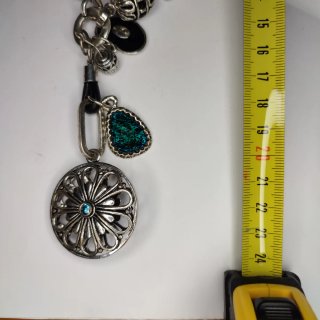 Collar largo con dije floral azul