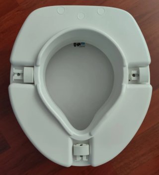 Asiento elevador inodoro Wenko Secura 12 cm