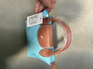 Borsa in tela a mano e tracolla colore blue