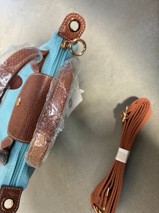 Borsa in tela a mano e tracolla colore blue