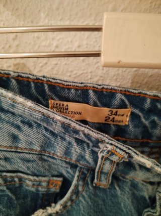 Falda vaquera Sfera midi desgastada talla 34