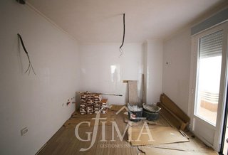 Casa adosada en venta en Tomelloso