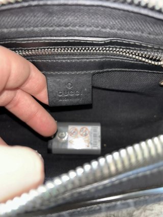 Riñonera Gucci negra GG