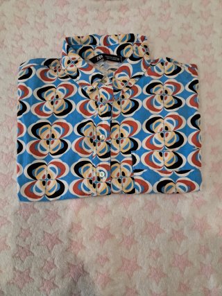 Camicia corta donna con colletto stampato. Buono stato.