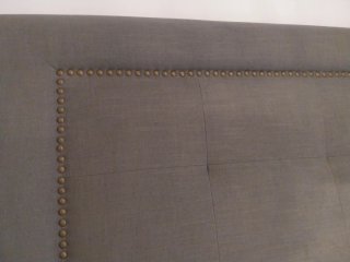 Cabecero de cama tapizado gris para cama de 1.50