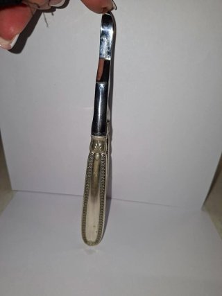 Pinza Aprispumante Metallo Argento