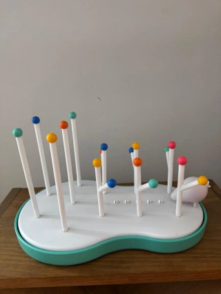 Escurrebiberones con diseño de pájaro