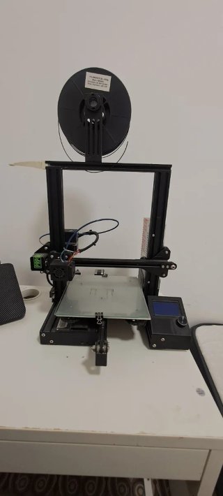 Impresora 3D Negra y Plateada