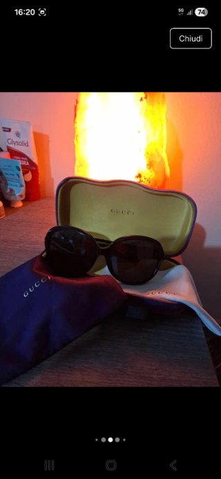Occhiali da sole Gucci neri con custodia viola