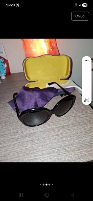 Occhiali da sole Gucci neri con custodia viola