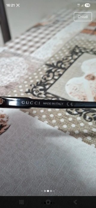 Occhiali da sole Gucci neri con custodia viola