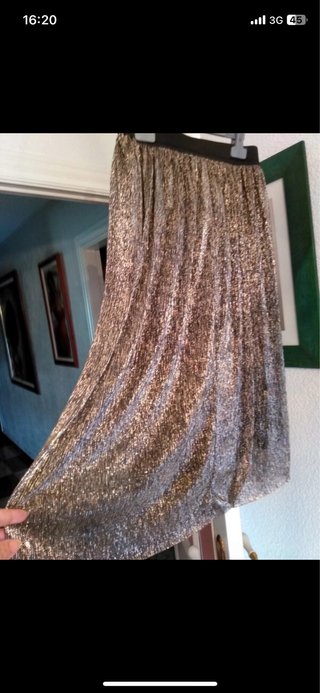 Falda fiesta color gris plateado,talla L nuevas