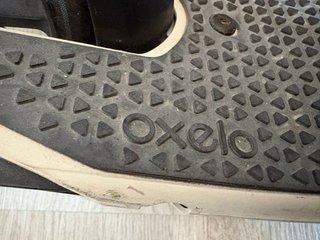 Patinete plegable blanco y negro