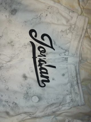 Conjunto Jordan Verano Gris y Blanco. Talla L .