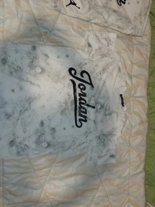 Conjunto Jordan Verano Gris y Blanco. Talla L .