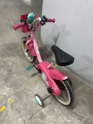 Bici niña rosa con ruedines