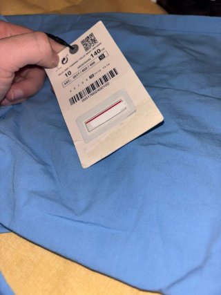 Mono azul con bordado