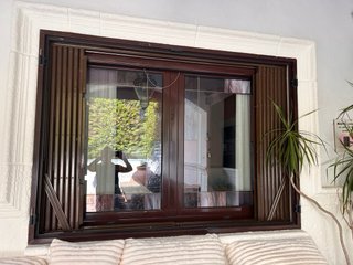 Ventana mallorquina abatible 4hojas.Dos ventanas