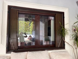Ventana mallorquina abatible 4hojas.Dos ventanas