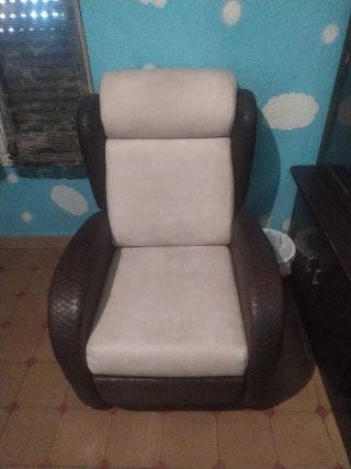 Sillón reclinable beige y negro