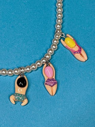 Collar perlas colgantes nadadores