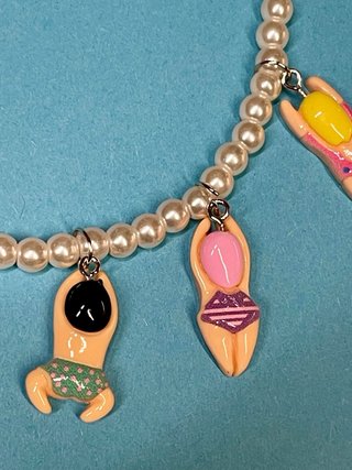 Collar perlas colgantes nadadores
