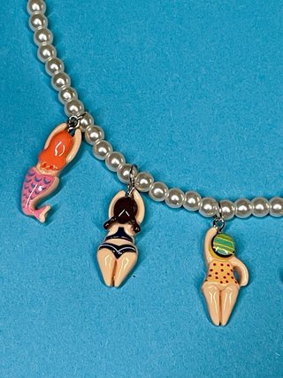 Collar perlas colgantes nadadores