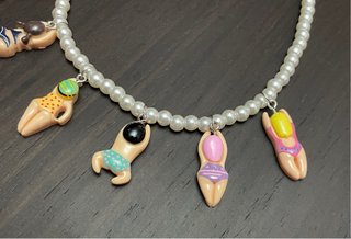 Collar perlas colgantes nadadores