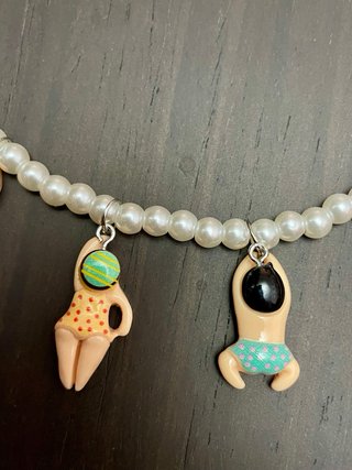 Collar perlas colgantes nadadores