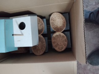 Cajas nido madera y mimbre colores