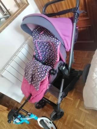 Carro de bebé rosa y gris
