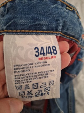 Jeans corti uomo strappati