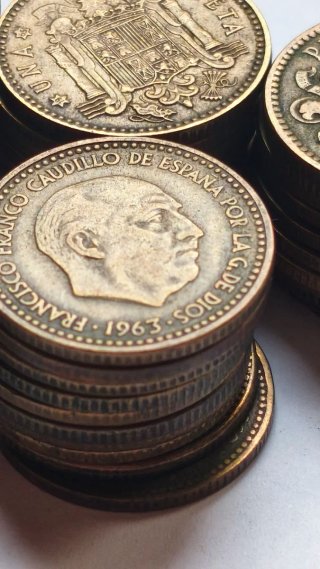 50 monedas de 1 peseta de franco del año 1963
