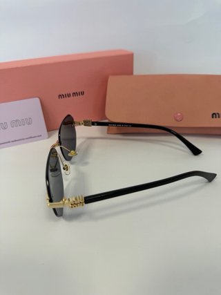 Gafas Miu Miu Negras y Doradas
