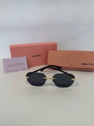 Gafas Miu Miu Negras y Doradas