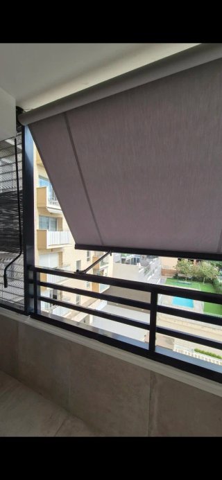 Toldo de lona gris  Medidas 4,10 lineal.