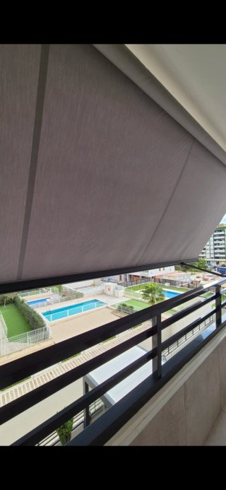 Toldo de lona gris  Medidas 4,10 lineal.