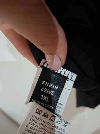 Maglietta nera con paillettes