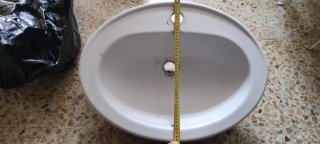 Lavabo de loza blanco