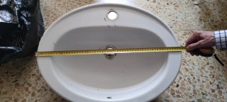 Lavabo de loza blanco