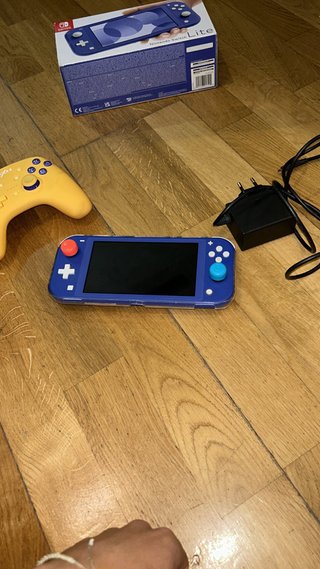 Nintendo Switch Lite + Accesorios