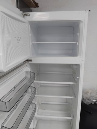 Nevera + garantía + transporte