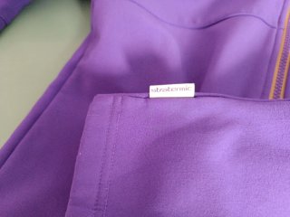 Cortavientos niña morado con detalles