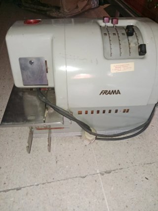 Máquina antigua Frama de etiquetas .