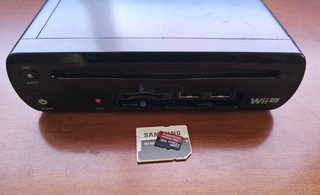 WiiU negra 32 gb con mandos, juegos y disco duro.