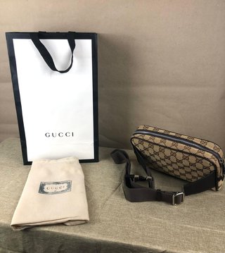 Riñonera Gucci GG beige