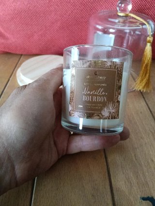 Candela decorativa con tapa y borla