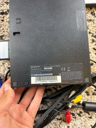 Playstation 2 slim with 2 controllers and 15 games