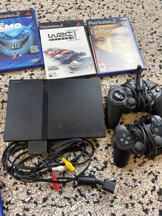 Playstation 2 slim with 2 controllers and 15 games